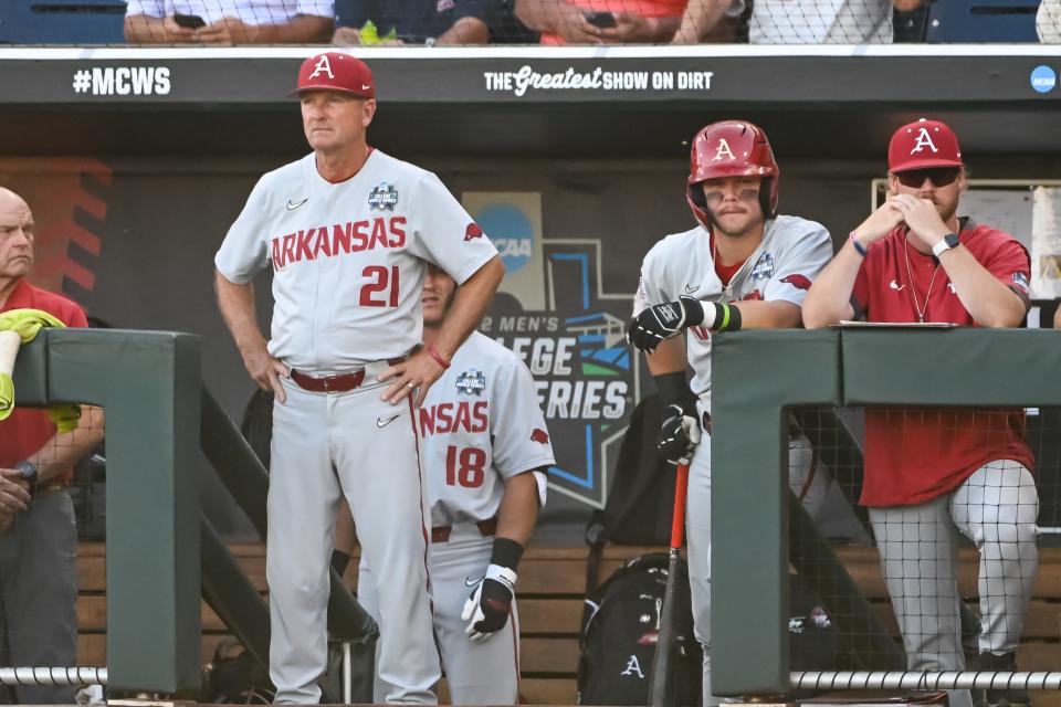 Jun 21, 2022; Omaha, NE, USA; Arkansas Razorbacks head coach Dave Van Horn (21) watches action against the Auburn Tigers in the first inning at Charles Schwab Field. Mandatory Credit: Steven Branscombe-USA TODAY Sports