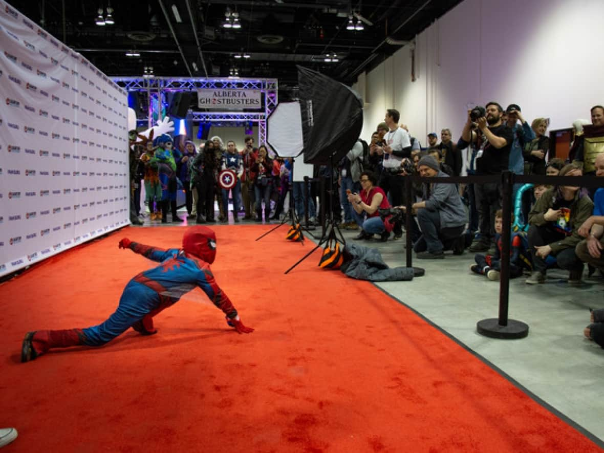 A small Spider-Man poses for the cameras at a previous Calgary Expo. (Submitted by Alex Kingcott - image credit)