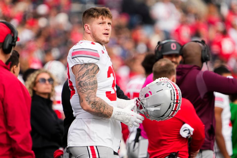 Nov 4, 2023; Piscataway, New Jersey, USA; Ohio State Buckeyes defensive end Jack Sawyer (33) waits to take the field as the offense has the ball during the NCAA football game against the Rutgers Scarlet Knights at SHI Stadium. Ohio State won 35-16.