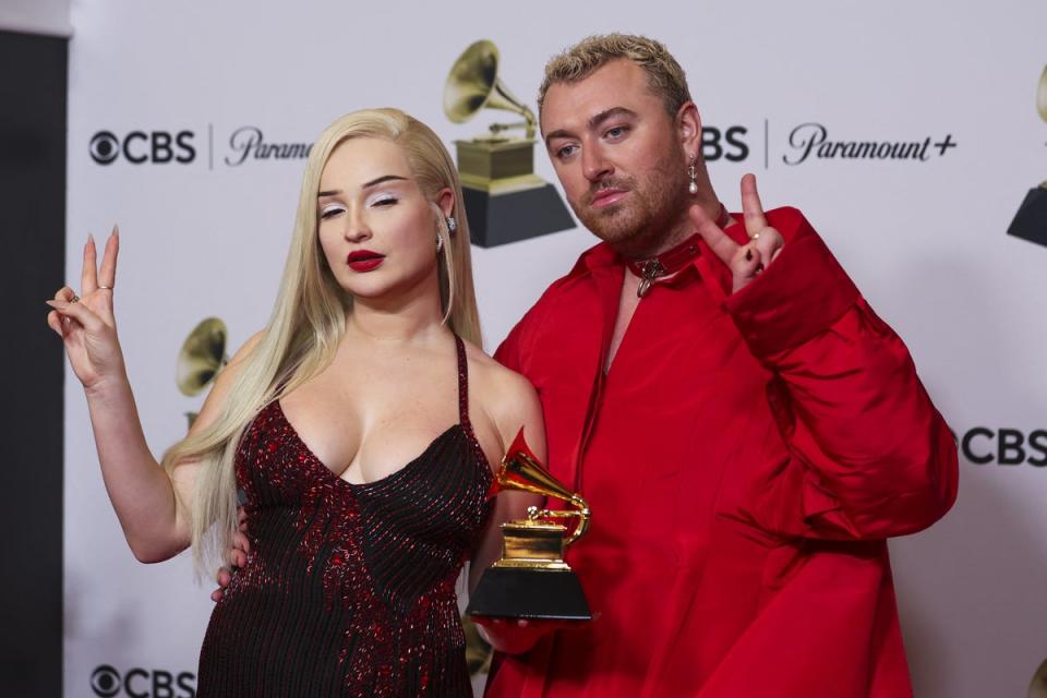 Sam Smith and Kim Petras pose with their award for Best Pop Duo/Group Performance for “Unholy” during the 65th Annual Grammy Awards (REUTERS)
