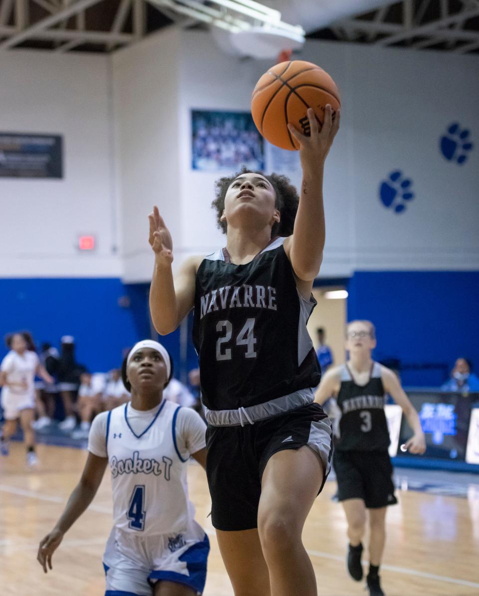 Rachel  Leggett (24) takes it to the hoop during the Navarre vs Washington girls basketball game at Booker T. Washington High School in Pensacola on Wednesday, Nov. 17, 2021.