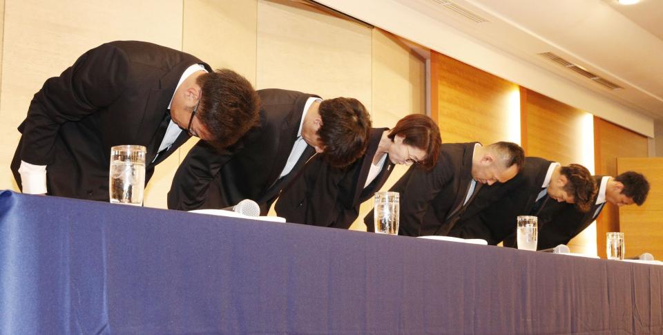 In this Aug. 20, 2018, photo, Yuya Nagayoshi, far left, Takuya Hashimoto, 2nd from left, Takuma Sato, 2nd from right, and Keita Imamura, far right, of Japanese men's basketball team for the Asian Games bow in apology at a press conference in Tokyo, after being stripped of their national team membership and sent back home in Jakarta. The four Japanese basketball players who hired prostitutes during the Asian Games in Indonesia have been suspended from play for one year. The head of the Japan Basketball Association announced the suspensions at a news conference in Tokyo on Wednesday, Aug. 29. (Kyodo News via AP)