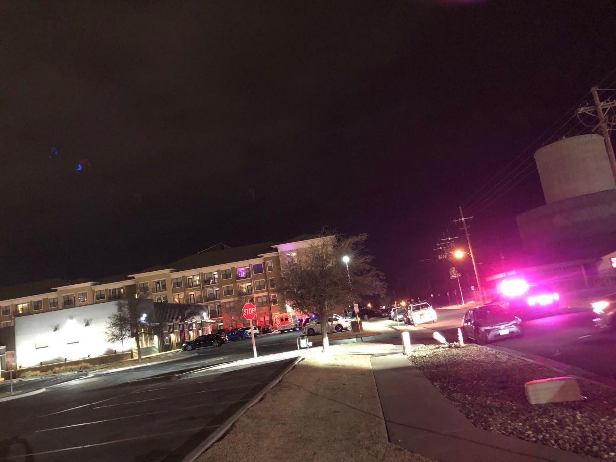 Lubbock police block off Third Street west of University Avenue Sunday evening north of the Texas Tech campus while SWAT worked a scene at the Raider Park garage. Police say a man was threatening to shoot from the top of the parking complex.