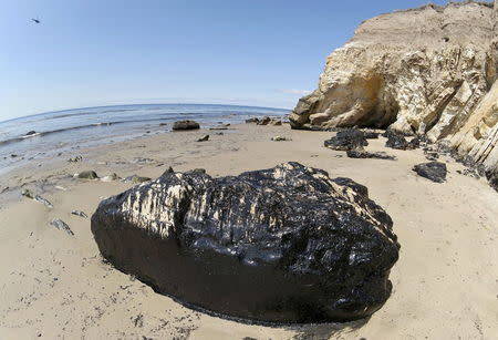 An oil covered rock is pictured at Refugio State Beach after a massive oil spill on the California coast in Goleta, California May 22, 2015. REUTERS/Jonathan Alcorn