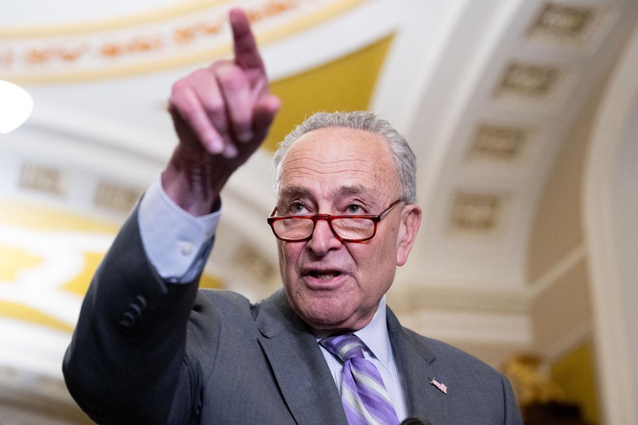 US Senate Majority Leader Chuck Schumer, Democrat of New York, speaks to the media following the weekly Senate party luncheons at the US Capitol in Washington, DC, on April 9, 2024.