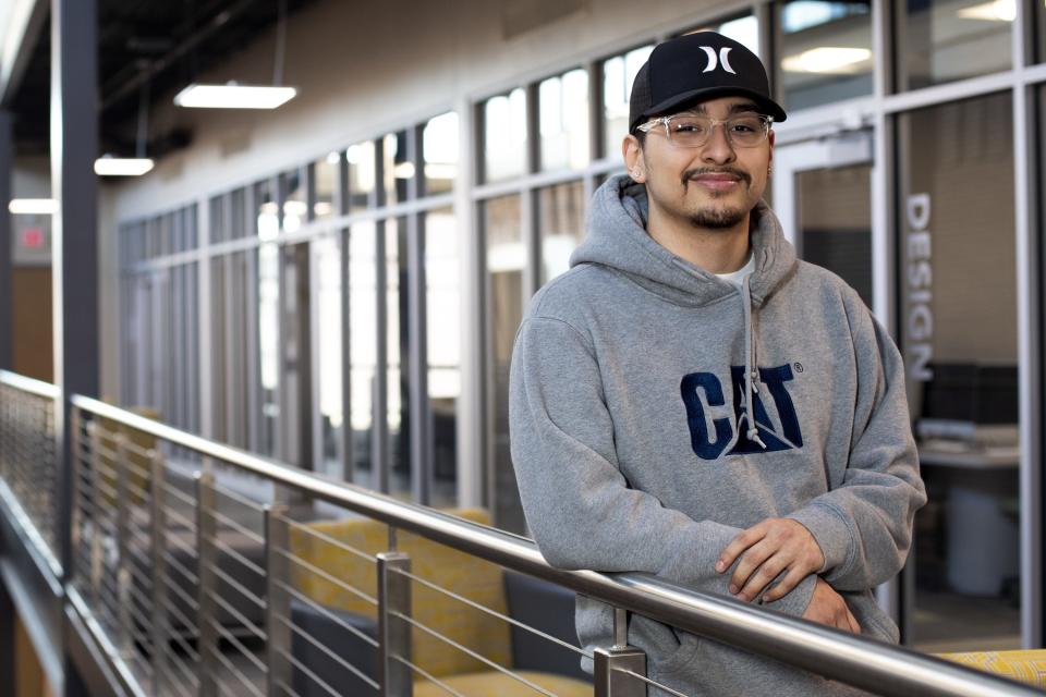 Emmanuel Vargas poses for a portrait at the College of Business building  on the campus of Northeast Wisconsin Technical College in Green Bay. Vargas is studying digital media.