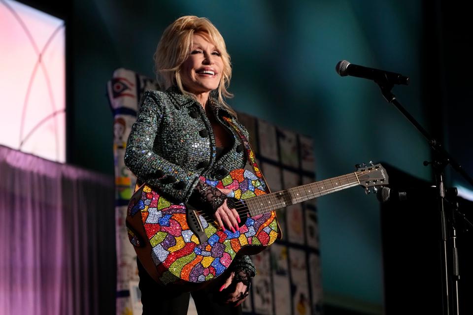 Aug 9, 2022; Columbus, Ohio, USA;  Dolly Parton sings during Ohio First Lady Fran DeWine's luncheon to celebrate the success and raise money for Dolly Parton’s Imagination Library of Ohio. Mandatory Credit: Adam Cairns-The Columbus Dispatch