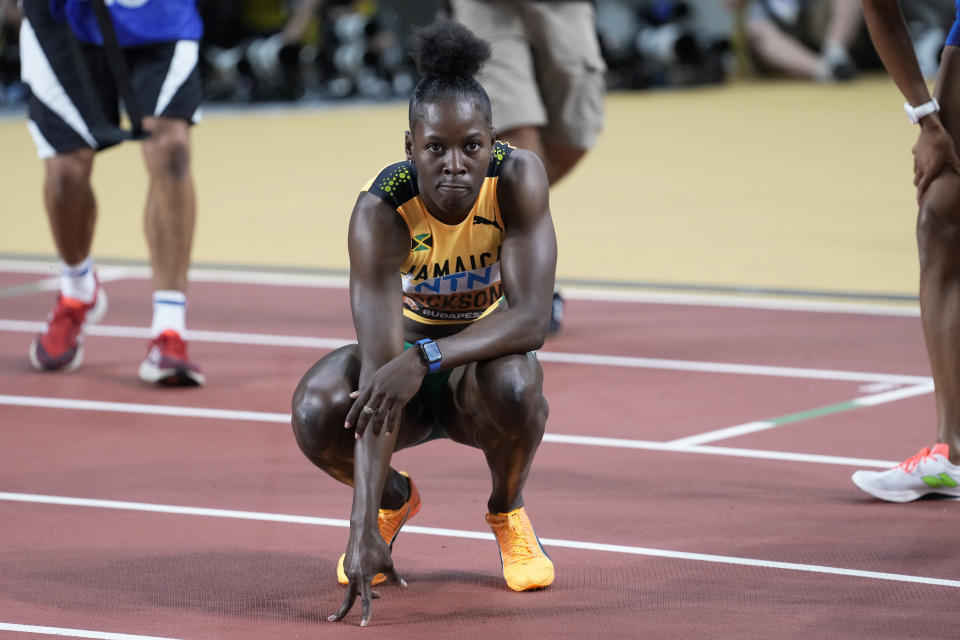 Shericka Jackson, of Jamaica, reacts after winning the gold medal in the Women's 200-meters final during the World Athletics Championships in Budapest, Hungary, Friday, Aug. 25, 2023. (AP Photo/Matthias Schrader)