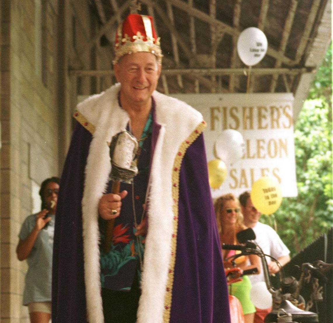 Mel Fisher, with his conch cepter, leads a parade of fans through Key West’s Old Town on Mel Fisher Appreciation Day.