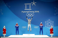 <p>Gold medalist Andreas Wellinger of Germany (C) celebrates on the podium with silver medalist Johann Andre Forfang of Norway (L) and bronze medalist Robert Johansson of Norway (R) during the Medal Ceremony for the Men’s Ski Jumping Normal Hill Individual on day two of the PyeongChang 2018 Winter Olympic Games at Medal Plaza on February 11, 2018 in Pyeongchang-gun, South Korea. (Photo by Dan Istitene/Getty Images) </p>