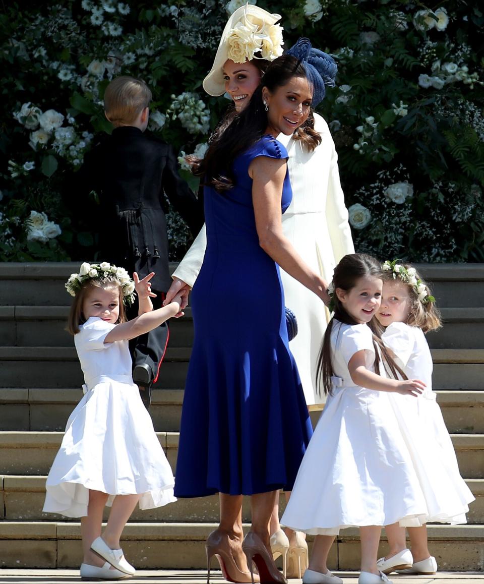 The Duchess of Cambridge with Princess Charlotte and other bridesmaids arrive at St George's Chapel in Windsor Castle