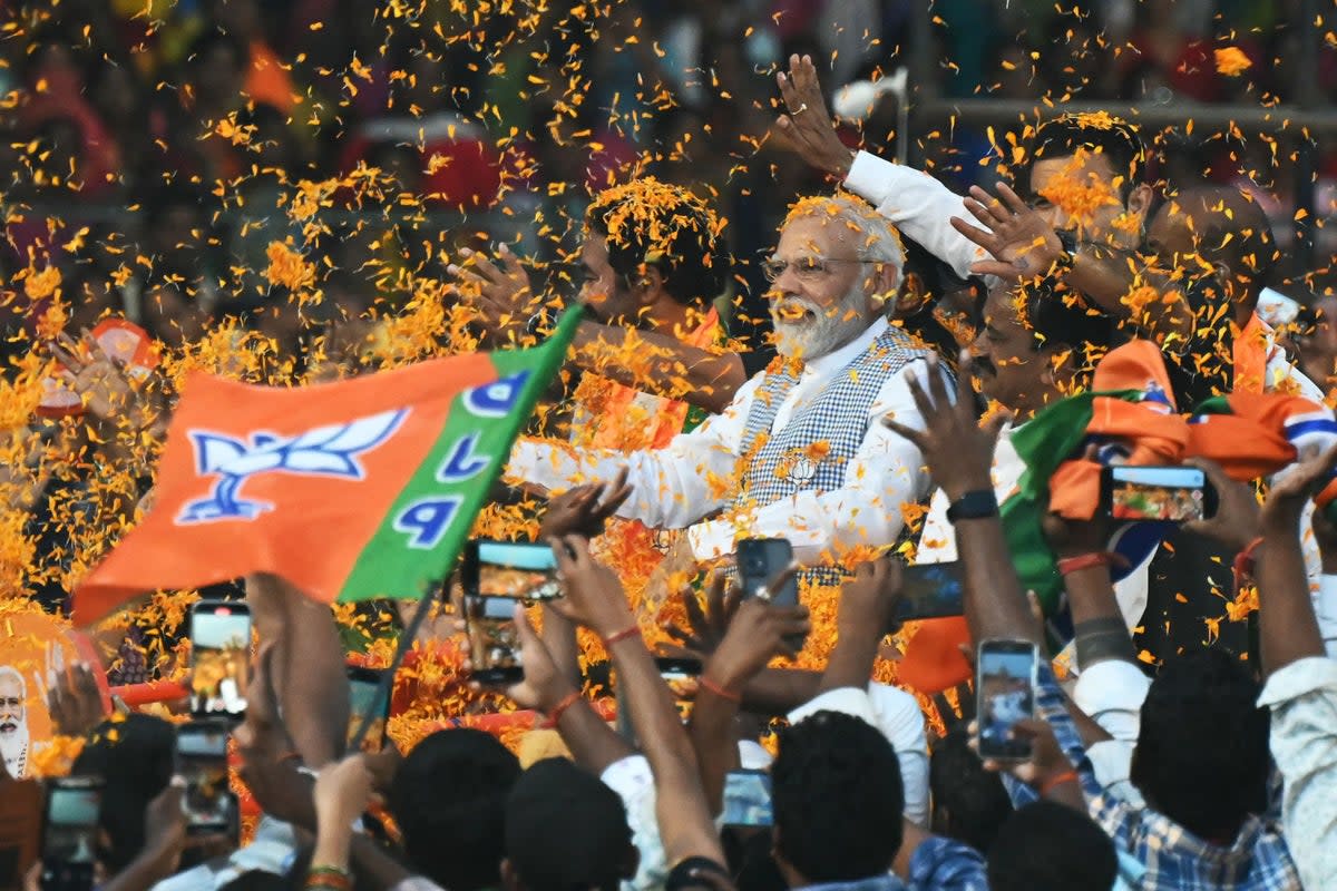 File: Indian prime minister Narendra Modi (C) arrives to attend a Bharatiya Janata Party (BJP) campaign meeting (AFP via Getty Images)