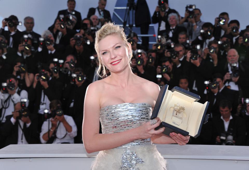 Kirsten Dunst with her best-actress award at the 64th Cannes Film Festival in 2011