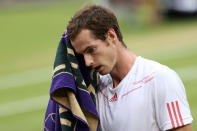 Andy Murray of Great Britain shows his dejection during his Gentlemen's Singles final match against Roger Federer at Wimbledon.