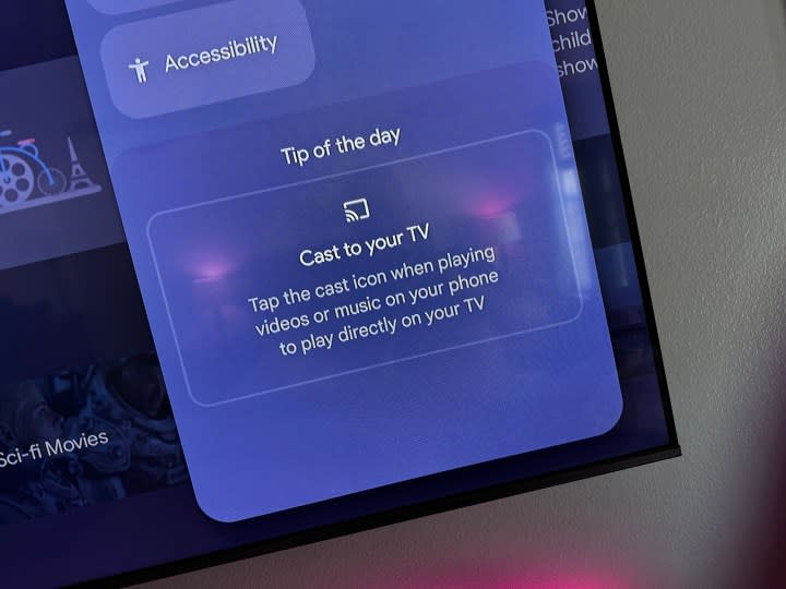 A Chromecast tip on a TV.