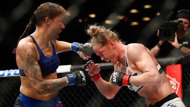 De Randamie (left) and Holm (right) come to blows. Pic: Getty