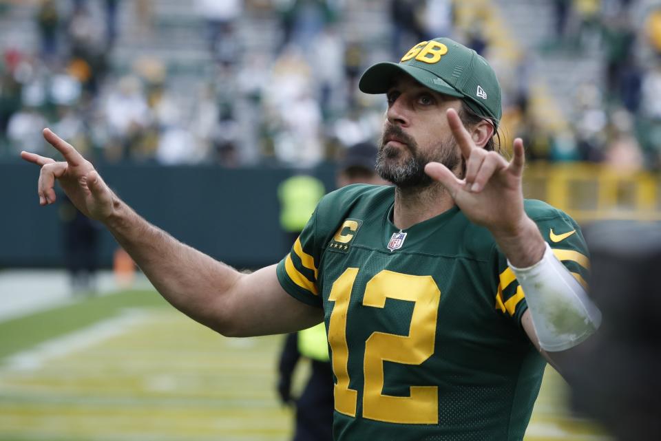 Green Bay Packers' Aaron Rodgers reacts as he leaves the field after during the second half of an NFL football game against the Washington Football Team Sunday, Oct. 24, 2021, in Green Bay, Wis. The Packers won 24-10. (AP Photo/Matt Ludtke)