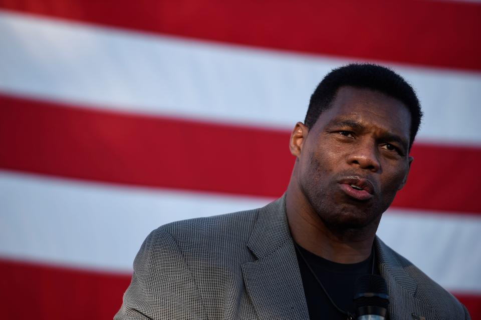 U.S. Senate candidate Herschel Walker addresses the crowd during a November 2021 campaign event at the Columbia County GOP Headquarters in Martinez. Walker is a football legend, the star player on the University of Georgia team that won the 1980 national championship.