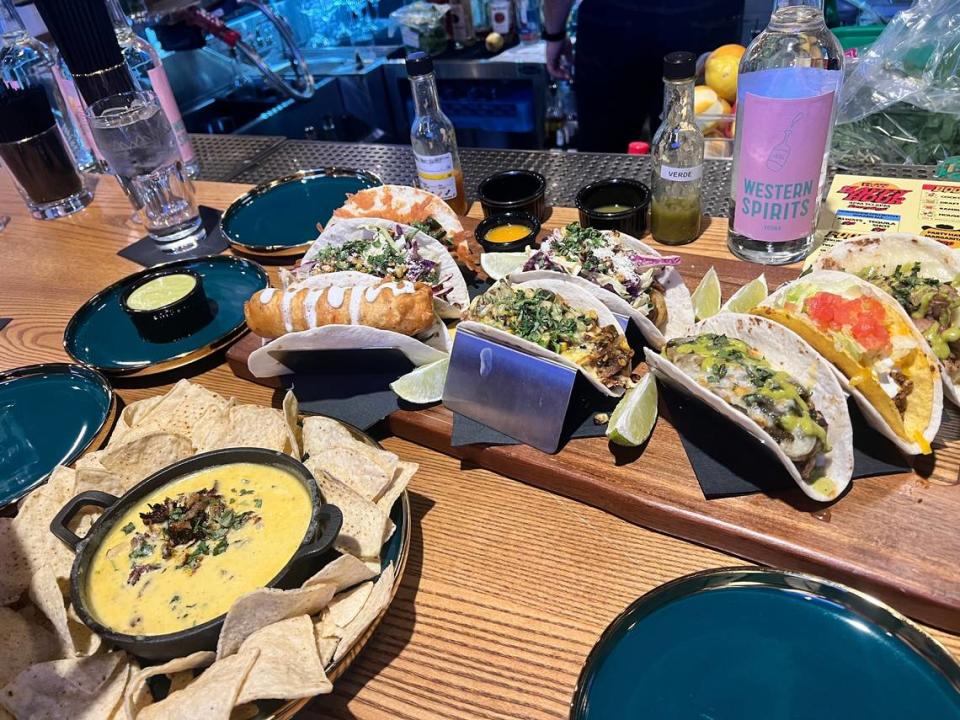 Eight tacos highlight House of Western’s menu, along with Tex-Mex options such as Terlingua Gold, foreground.
