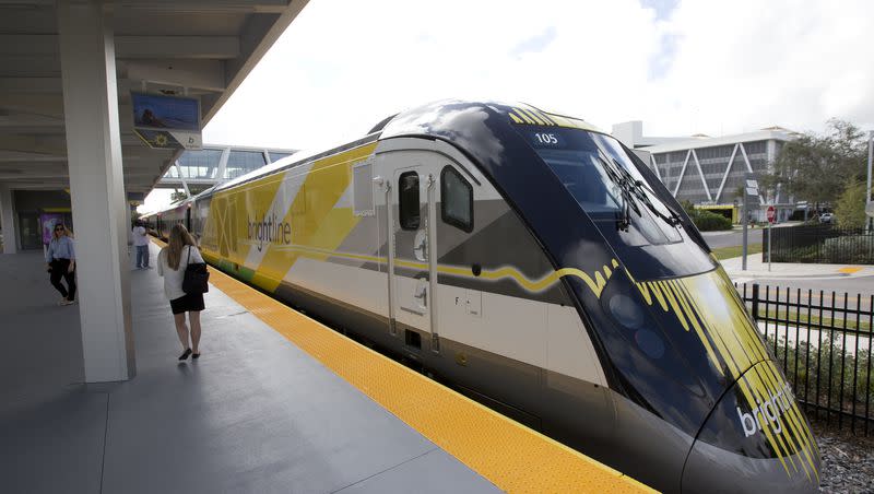 In this Jan. 11, 2018 file photo, a Brightline train sits at the station in Fort Lauderdale, Fla. Virgin Trains USA, which runs the Brightline train, is planning a high-speed train between Las Vegas and Southern California.