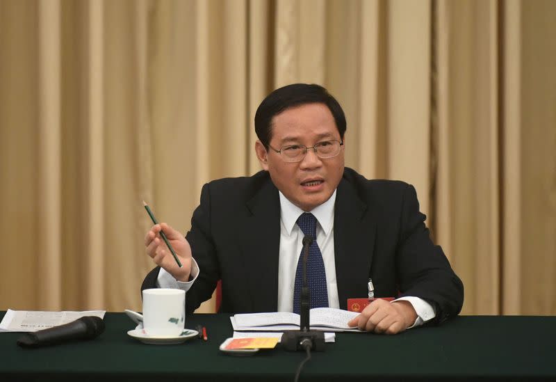 FILE PHOTO: Li Qiang, Communist Party Secretary of Jiangsu, speaks during the Jiangsu delegations group discussion during the National People's Congress (NPC), in Beijing