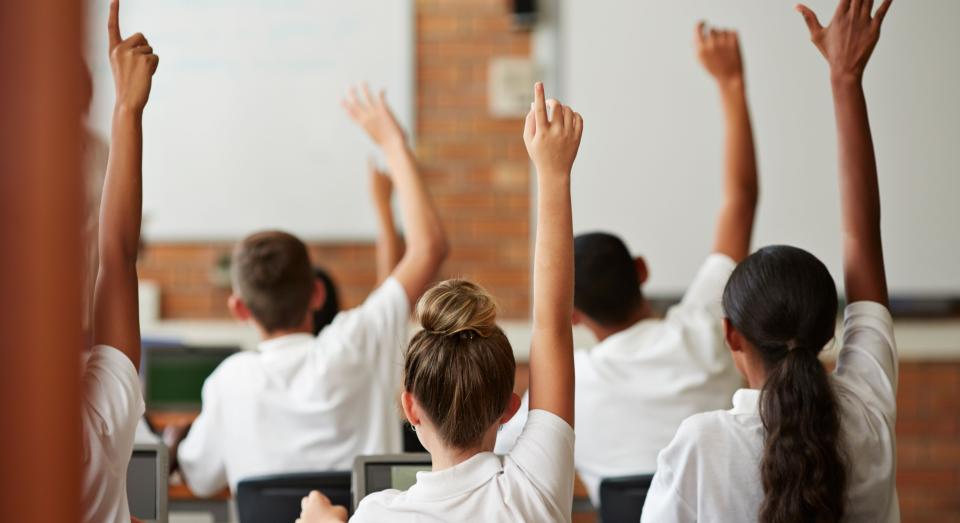 School pupils are being given pronoun stickers to help transgender classmates feel supported [Image: Getty]