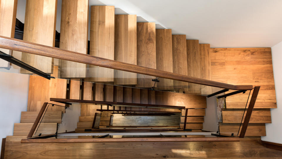 Architect Turett’s signature central staircase. - Credit: Compass