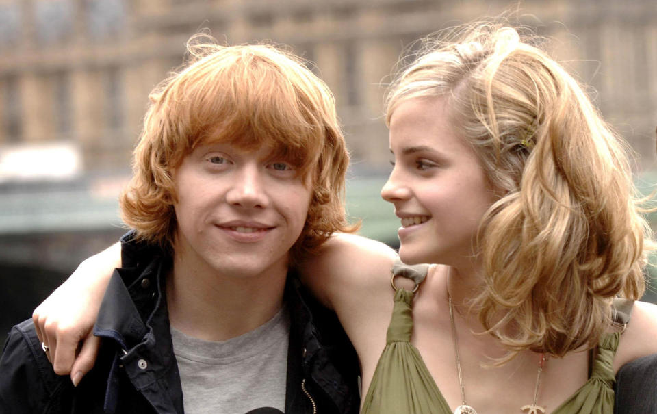  ALTERNATE CROP
File photo dated 25/06/07 of Rupert Grint (left) and Emma Watson. In an interview with FHM magazine, Grint said he had "no idea" what to do with all the money he has made from his film career but he was coy about rumours of a possible romance with co-star Emma Watson. 