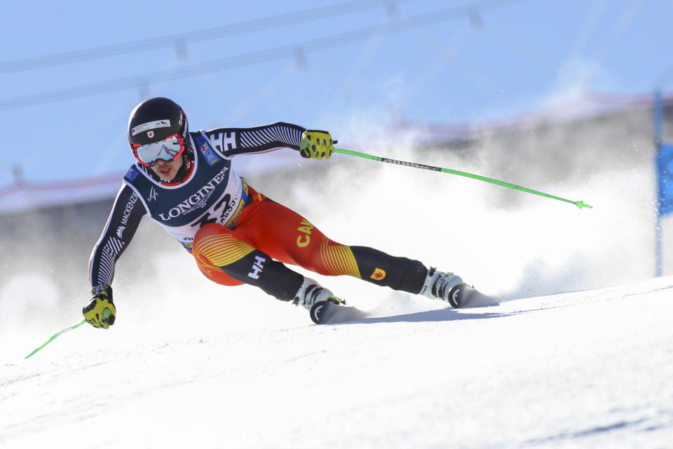 Canada's James Crawford competes during the super G portion of the men's combined race, at the alpine ski World Championships, in Cortina d'Ampezzo, Italy, Monday, Feb. 15, 2021. (AP Photo/Marco Trovati)