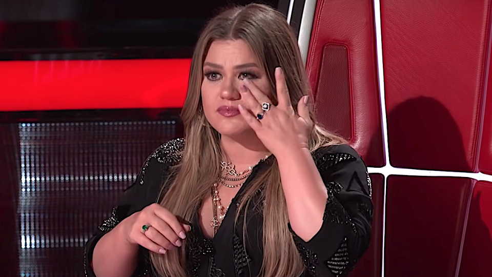  Kelly Clarkson cries after a performance on The Voice. 