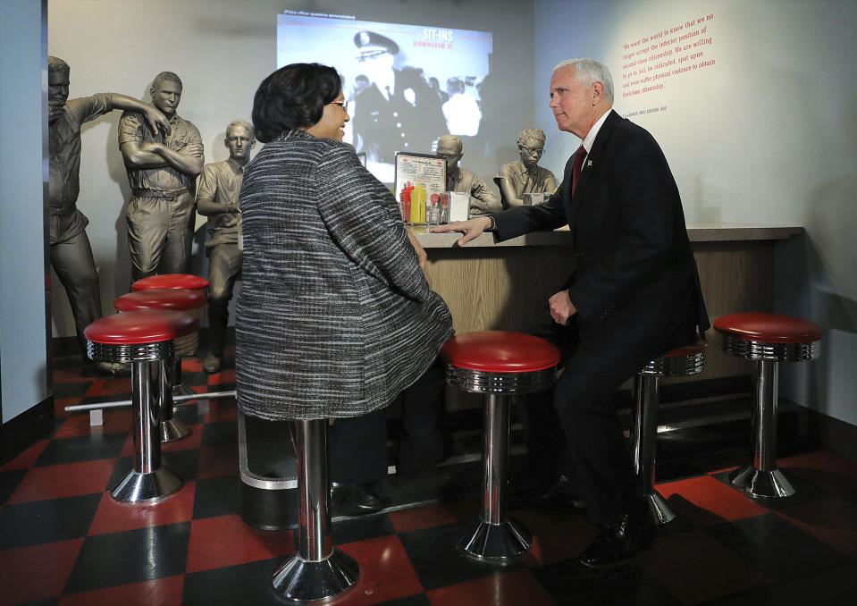 Vice President Mike Pence sits down with Director of Interpretation, Collections and Education Noelle Trent during a trip to the National Civil Rights Museum in Memphis Sunday, Jan. 19, 2020. Pence spoke at the church service in remembrance of the Rev. Martin Luther King Jr., the day before the federal holiday named after the civil rights leader. Pence says King touched the hearts of millions of Americans and his words continue to inspire. Pence acknowledged the nation's deep divide and says Americans must rededicate themselves to the ideals that King advanced. (Patrick Lantrip/Daily Memphian via AP)