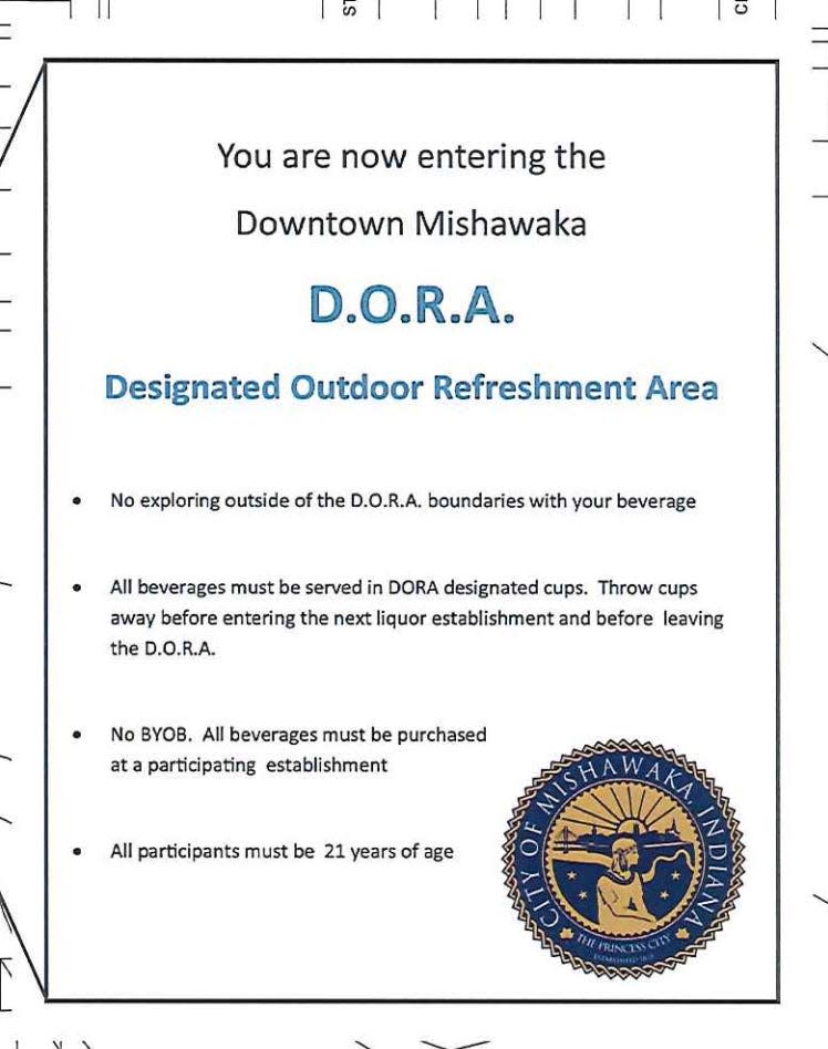 Mishawaka is proposing a Designated Outdoor Refreshment Area (DORA) for the Ironworks Plaza and Beutter Park that would allow people to buy and carry open alcoholic beverages inside the boundaries of the area. This is a prototype of a sign that will be placed at boundaries to the area.