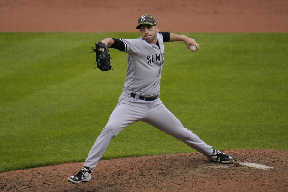 New York Yankees relief pitcher Lucas Luetge throws a pitch to the Baltimore Orioles during the sixth inning of a baseball game, Sunday, May 16, 2021, in Baltimore. (AP Photo/Julio Cortez)