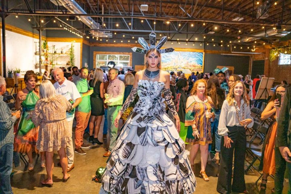 The 2022 Upcycled Fashion Show featured a dress designed by Itala Flores from billboard art created by Jesse Carkin. ArtPop Street Gallery turns to fashion to ensure its billboards don’t end up in landfills. Alex Cason