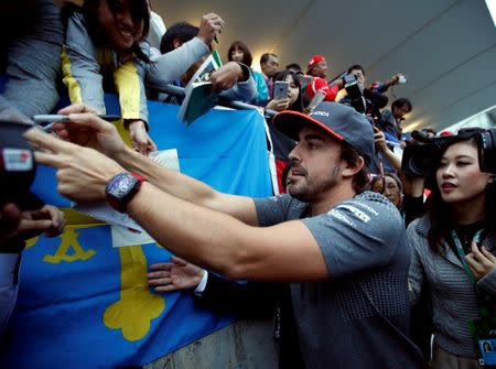 Formula One F1 - Japanese Grand Prix 2017 - Suzuka Circuit, Japan - October 5, 2017. McLaren's Fernando Alonso attends a fan event. REUTERS/Toru Hanai