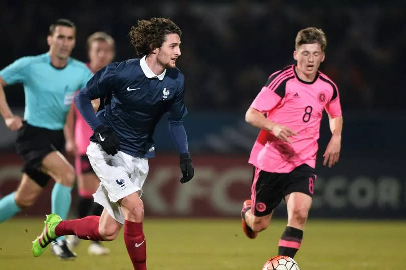 Gauld (R) has only represented Scotland at U-21 and U-19 level