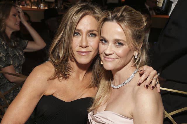 <p>Todd Williamson/CBS via Getty Images</p> Jennifer Aniston and Reese Witherspoon at the 81st Annual Golden Globe Awards