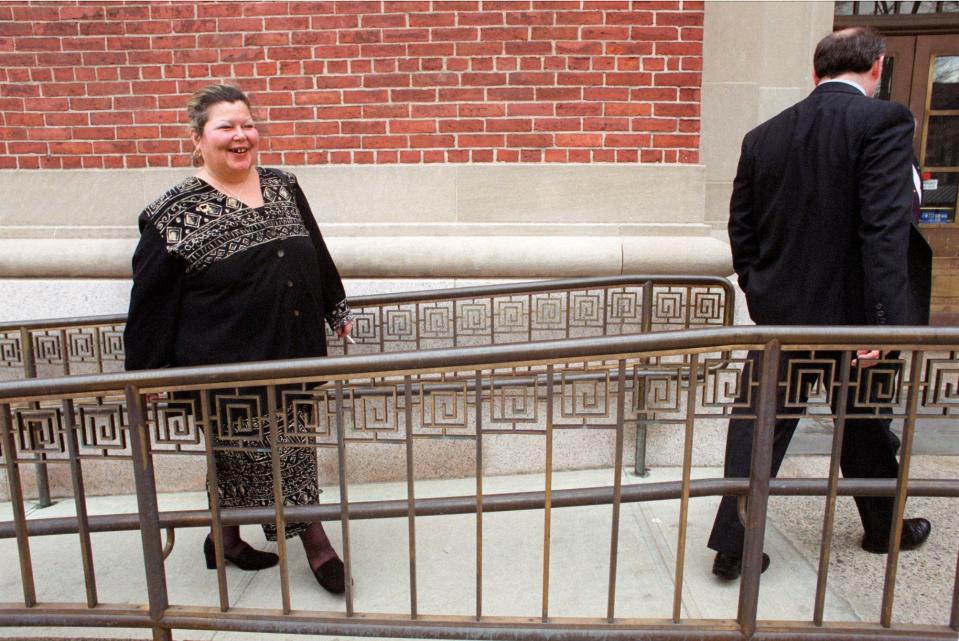 Operation Plunder Dome defendant Rosemary Glancy, Providence's deputy tax assessor at the time, heads into the John O. Pastore Federal Building as her case goes to the jury.