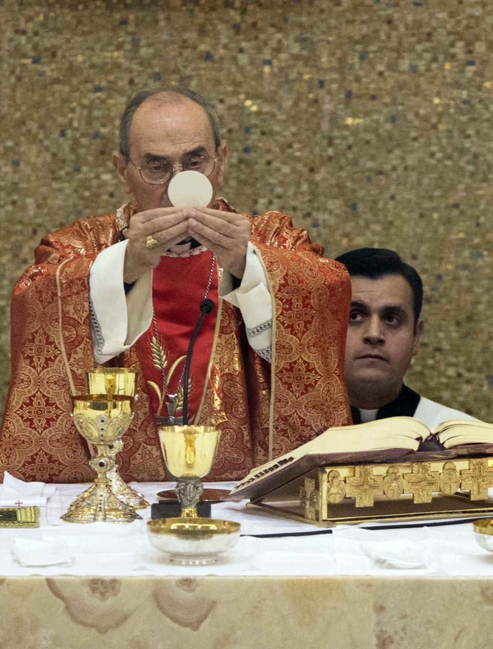 Cardinal Velasio De Paolis leads a mass celebrated at the Legion of Christ main headquarters, the Ateneo Pontificio Regina Apostolorum, in Rome, Wednesday, Jan. 8, 2014. The mass marks the opening of the Legion of Christ’s General Chapter, a month-long meeting where they’re going to approve new constitutions and elect a new leadership. The troubled Legion of Christ religious order is electing its new leadership for the first time since its founder was revealed to have been a pedophile and fraud. The process starting Wednesday will formally end the Vatican's three-year rehabilitation of the movement, a reform the Legion is touting as a success and critics have dismissed as a sham. (AP Photo/Andrew Medichini)