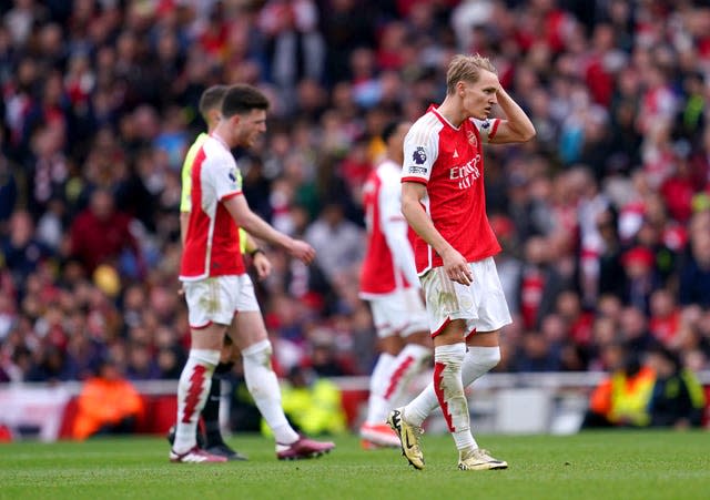 Arsenal's title hopes were dealt a major blow by defeat to Aston Villa