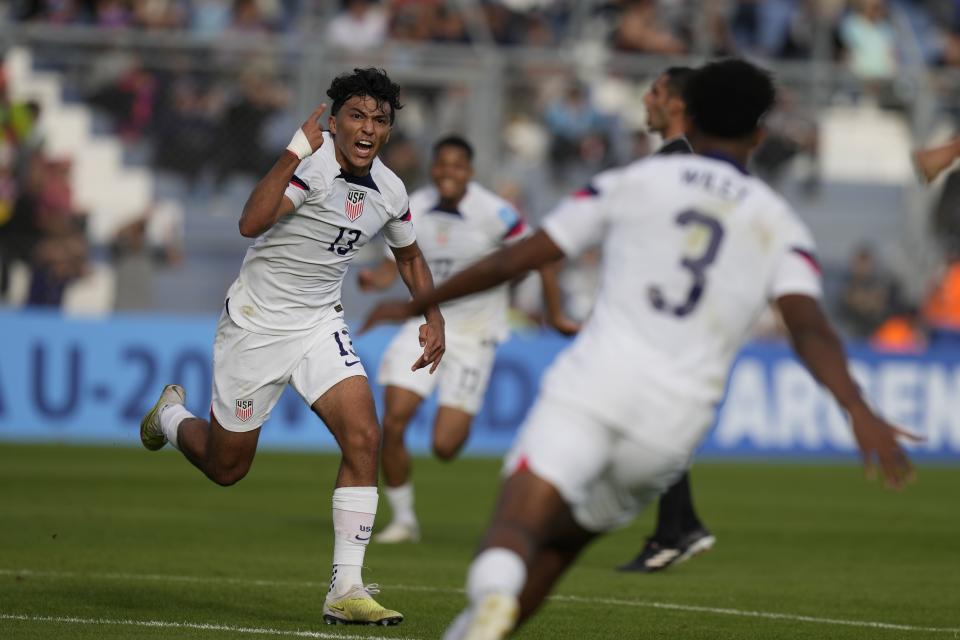 Jonathan Gomez, left, of the United States celebrates after scoring the first goal for his side during a FIFA U-20 World Cup Group B soccer match against Ecuador at the Bicentenario stadium in San Juan, Argentina, Saturday, May 20, 2023. (AP Photo/Natacha Pisarenko)