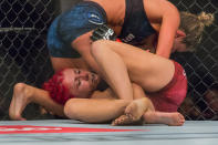 Ashley Yoder pins Randa Markos down during their strawweight preliminary bout at UFC Fight Night 162. (PHOTO: Dhany Osman / Yahoo News Singapore)