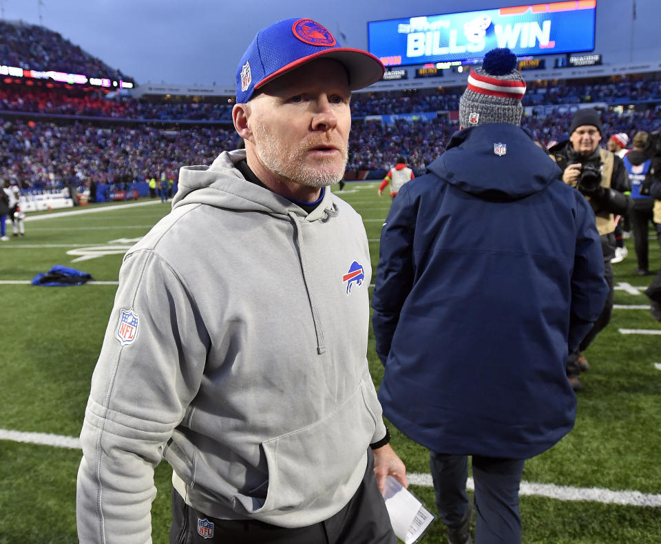FILE - Buffalo Bills head coach Sean McDermott, left, walks on the field after an NFL football game against the New England Patriots in Orchard Park, N.Y., Dec. 31, 2023. McDermott is getting help to address his red flag issues by adding former NFL official John Parry to his staff, a person with knowledge of the hiring confirmed to The Associated Press, Monday,May 13, 2024. The person spoke to The AP on the condition of anonymity because the team has not announced the hiring. The move was first reported by the New York Post. (AP Photo/Adrian Kraus, File)