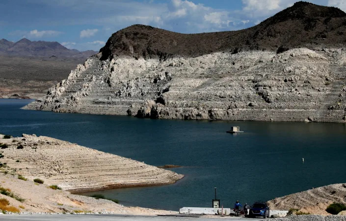 A white &quot;bathtub ring&quot; around Echo Bay is evidence of the declining water level in Lake Mead.