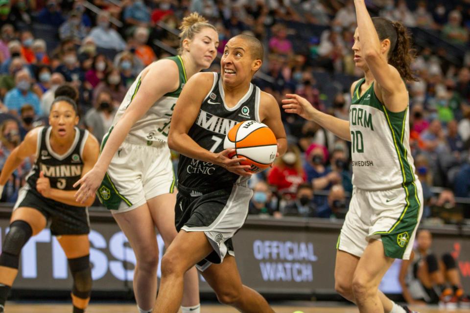 Minnesota Lynx guard Layshia Clarendon drives to the basket past Seattle Storm forward Katie Lou Samuelson and guard Sue Bird in the second quarter of a game Aug. 24 in Minneapolis.