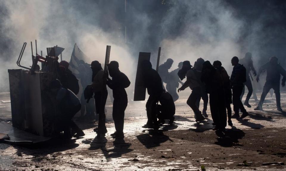 Demonstrators clash with riot police for a fourth straight day on Monday.