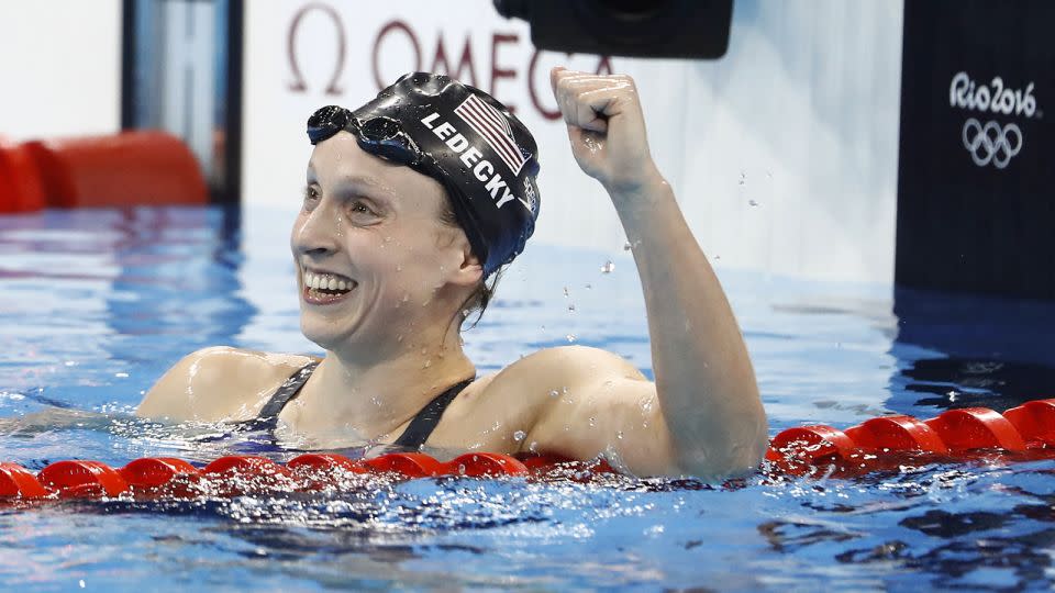 Katie Ledecky celebates after she broke the world record to win the women's 800m freestyle final at the Rio 2016 Olympic Games. - Odd Andersen/AFP/Getty Images