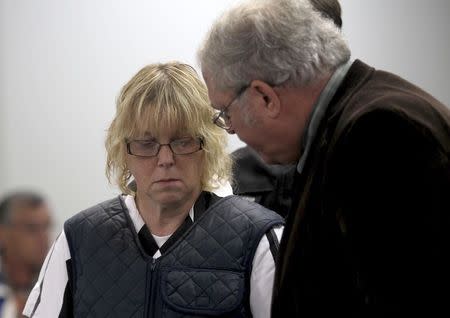 Joyce Mitchell (L) speaks with her lawyer Steven Johnston as she appears before Judge Buck Rogers in Plattsburgh City Court, Plattsburgh, New York June 15, 2015. REUTERS/G.N. Miller/NY Post/Pool