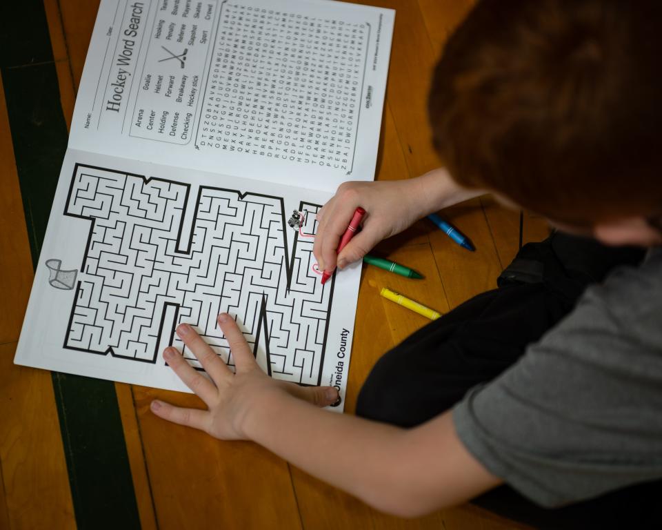 A student at Westmoreland Upper Elementary School does a maze in an activity book about the IIHF 2024 WomenÕs World Championship on Tuesday, February 27, 2024.