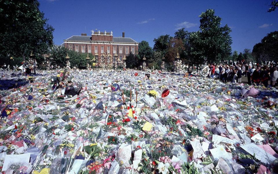 A sea of floral tributes outside Kensington Palace, immediately after the Princess's death in 1997 - Jeff Overs/BBC News & Current Affairs via Getty Images